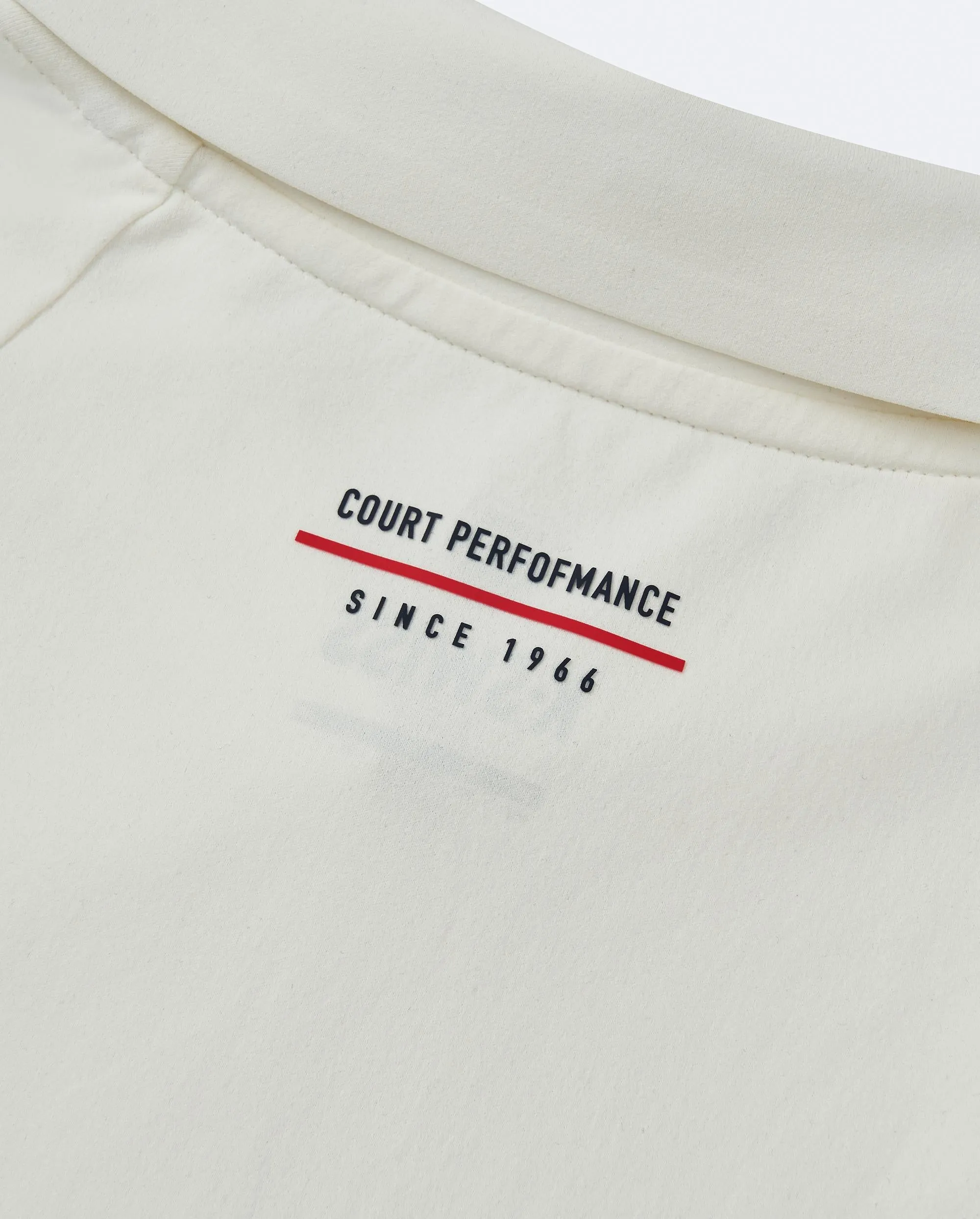 1010692-869 | MEN'S K-SWISS LOGO HALF-ZIP POLO SHIRT | POPPY/SEAFOAM