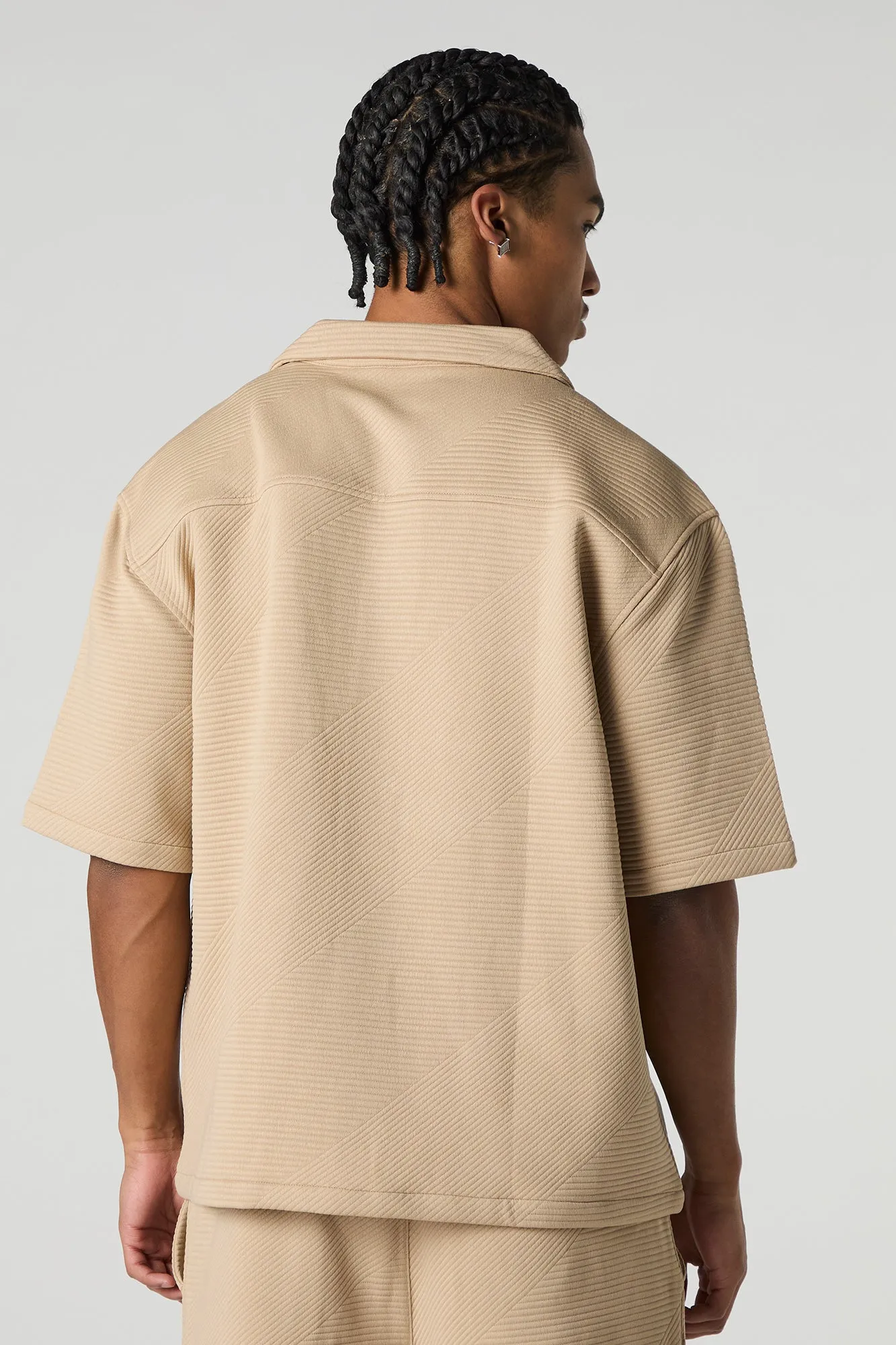 Polo boutonné texturé