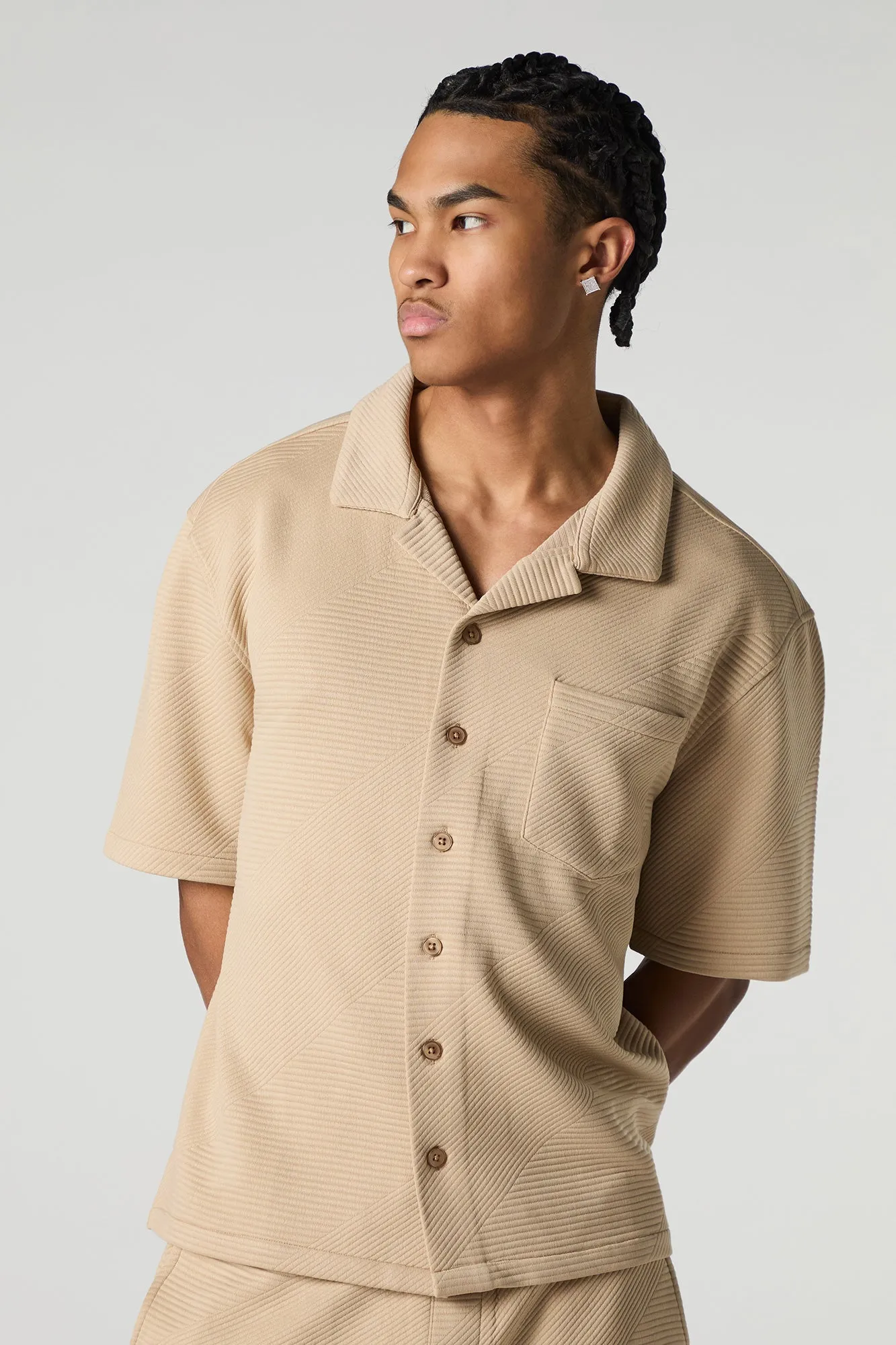 Polo boutonné texturé