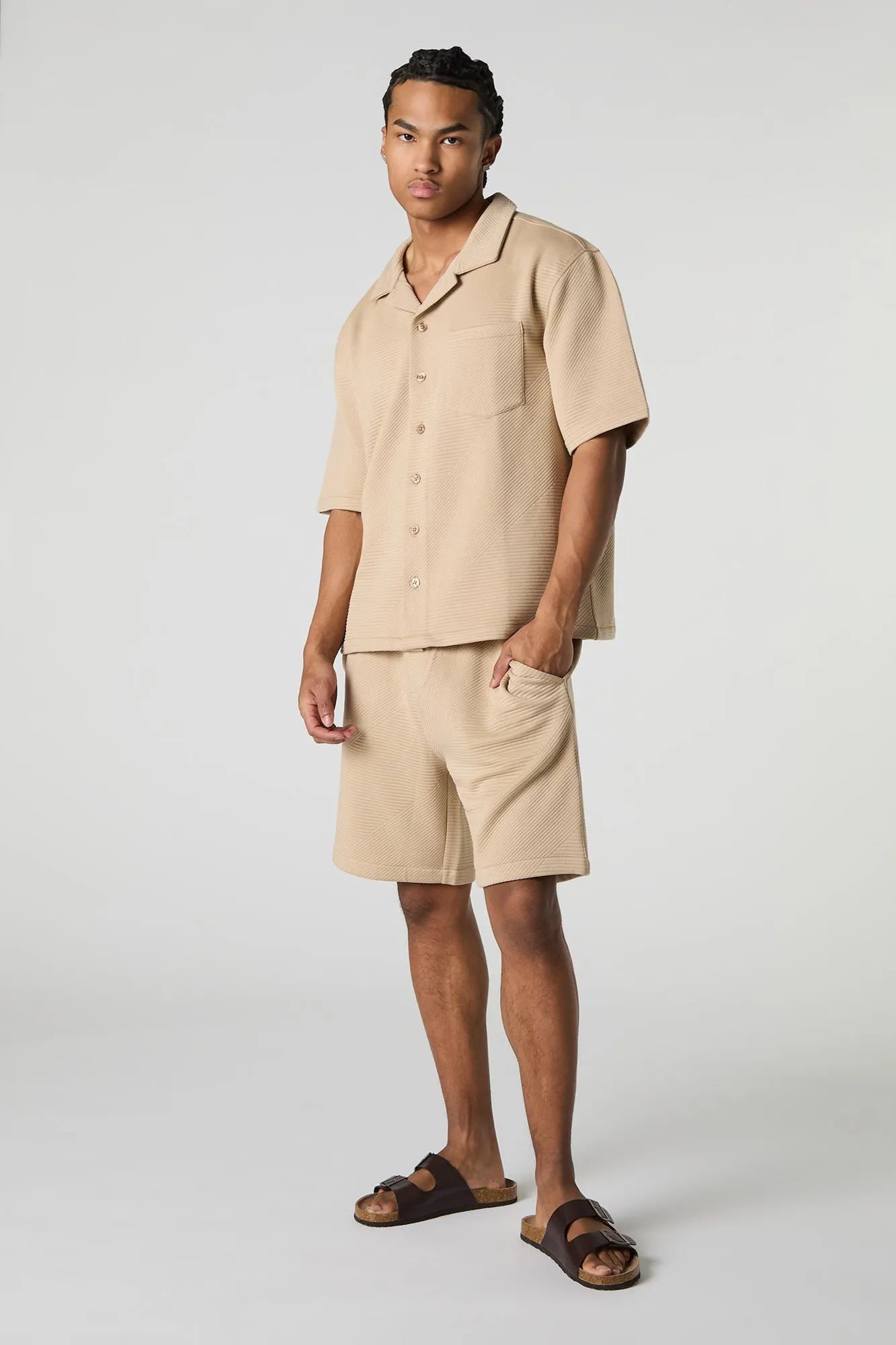 Polo boutonné texturé