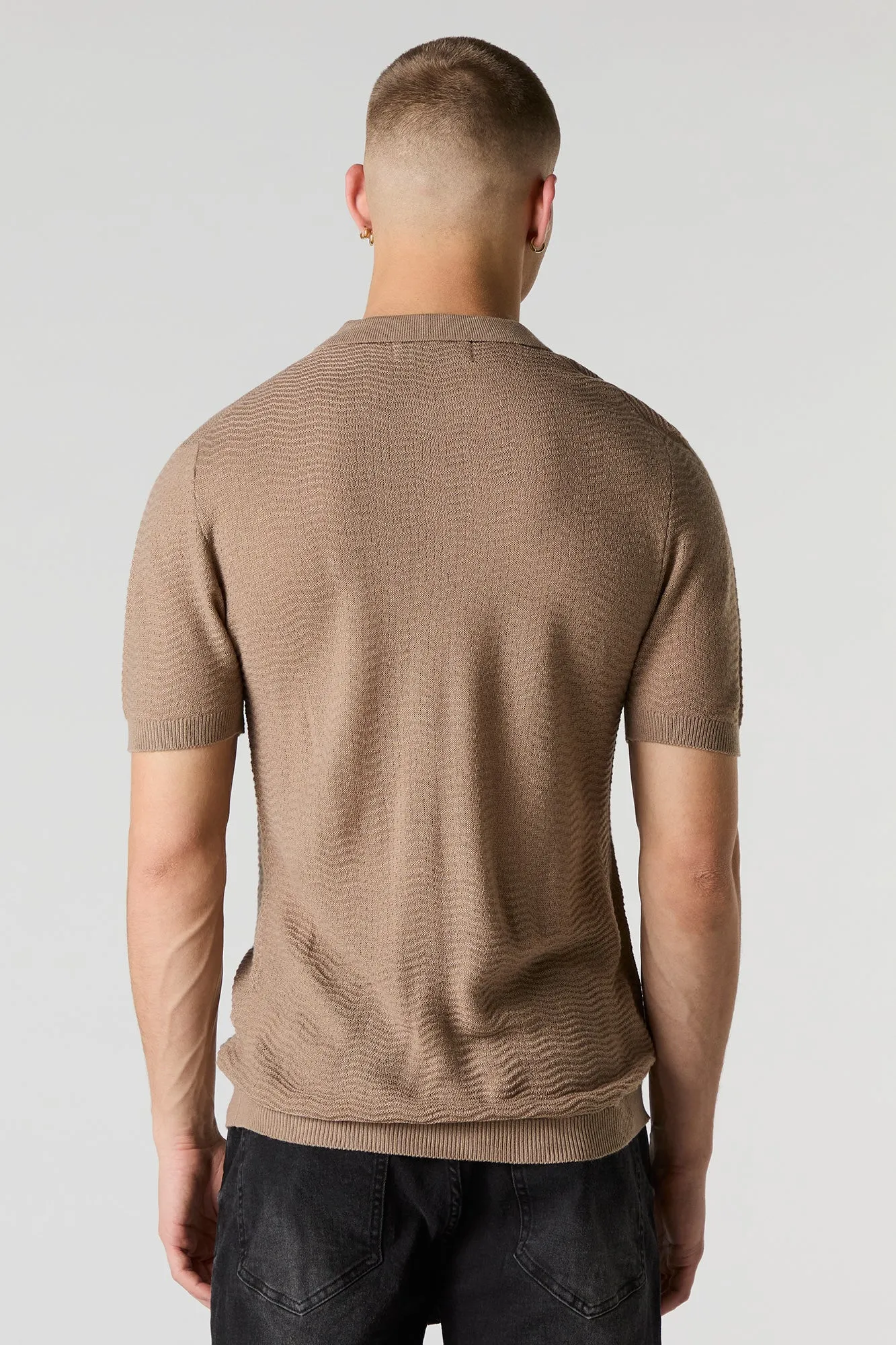 Polo en tricot texturé avec fermeture à glissière