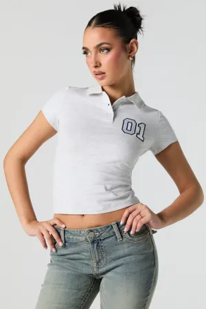 Polo ultracourt avec motif brodé